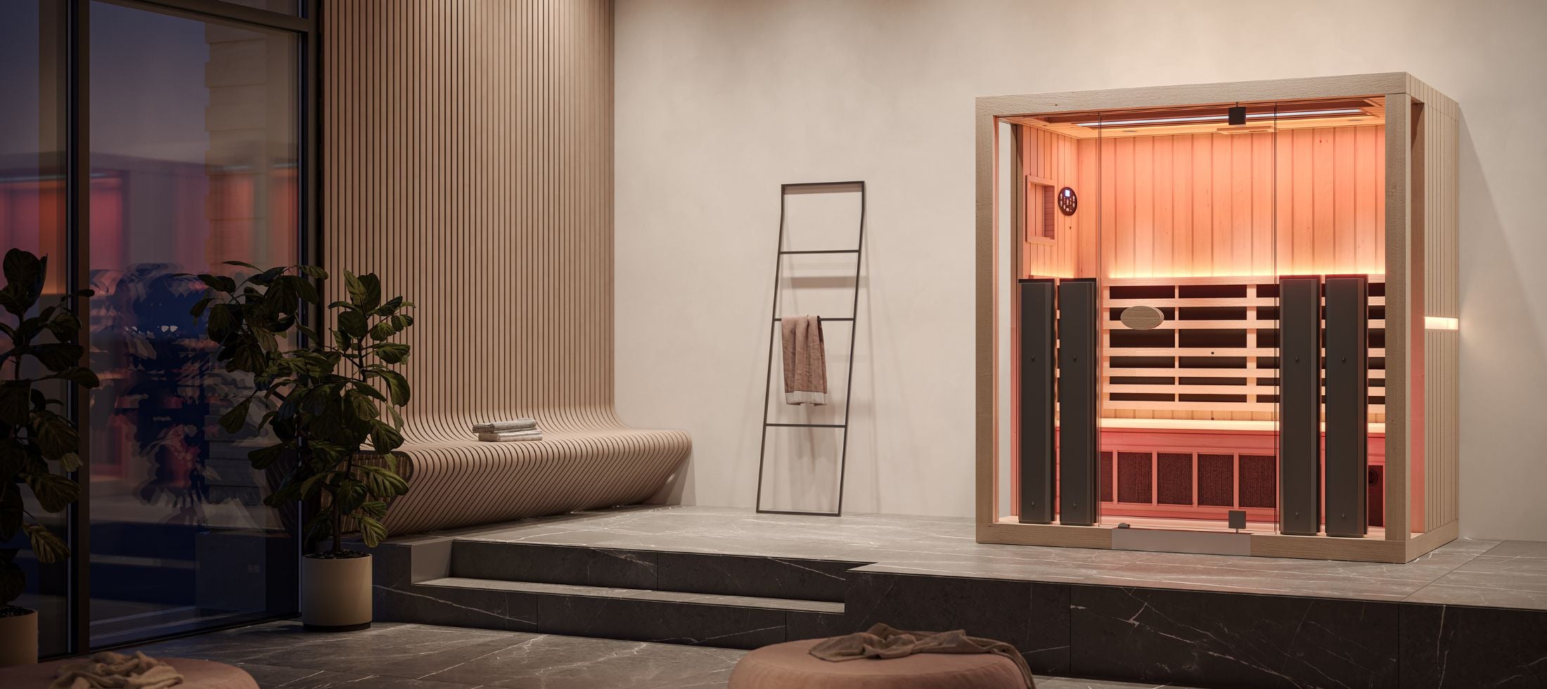 Infrared sauna in a modern room with plants and a mirror.